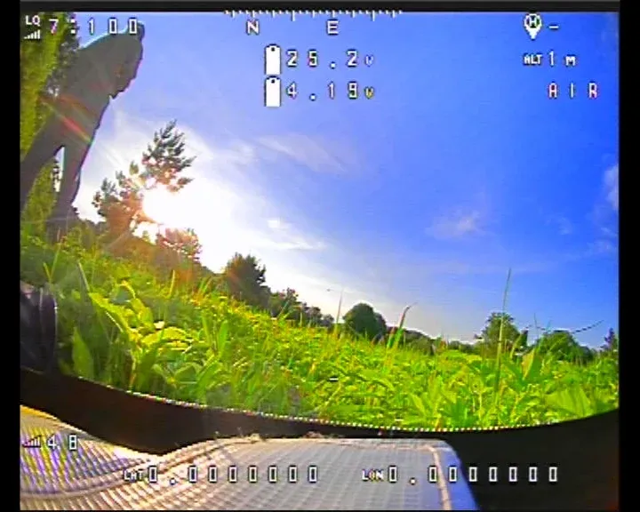 Analog pilot goggle DVR recording with complete OSD telemetry: flight timer, battery voltage, crosshairs.